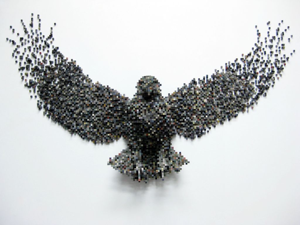 Disintegrating Eagle
(2011) 71 x 41 x 12 inches. Balsa wood, bass wood, ink, acrylic paint
